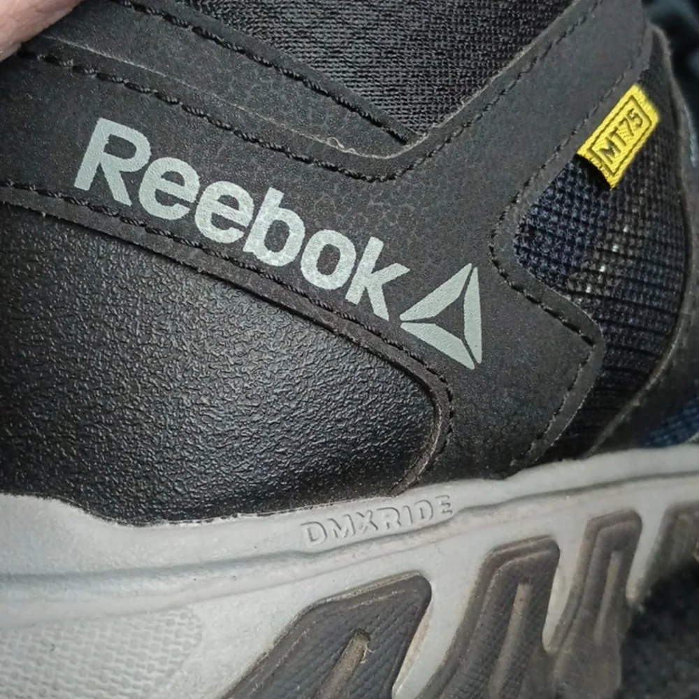 Men's Reebok alloy toe mid althetic construction work wear shoes . Worn once !